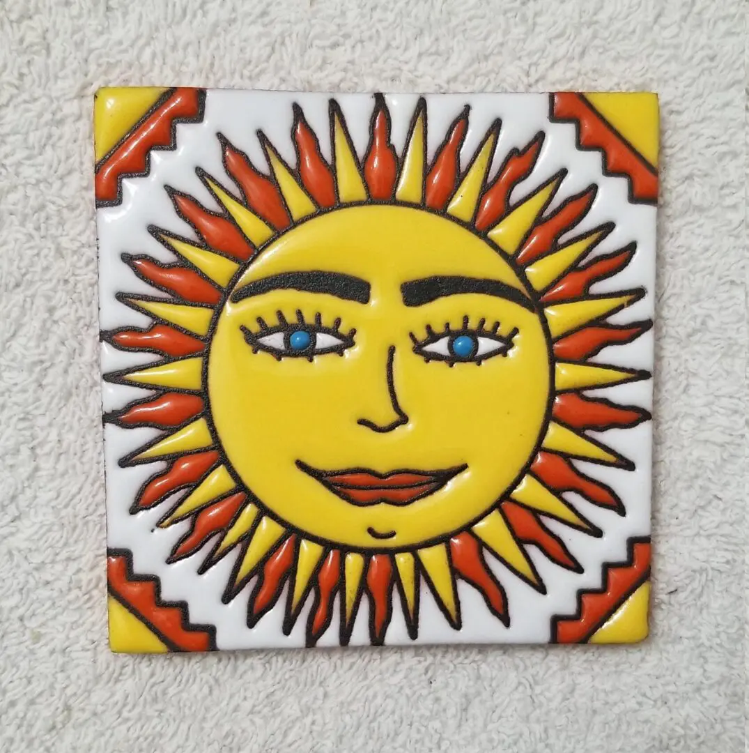 Colorful hand-painted sun face ceramic tile