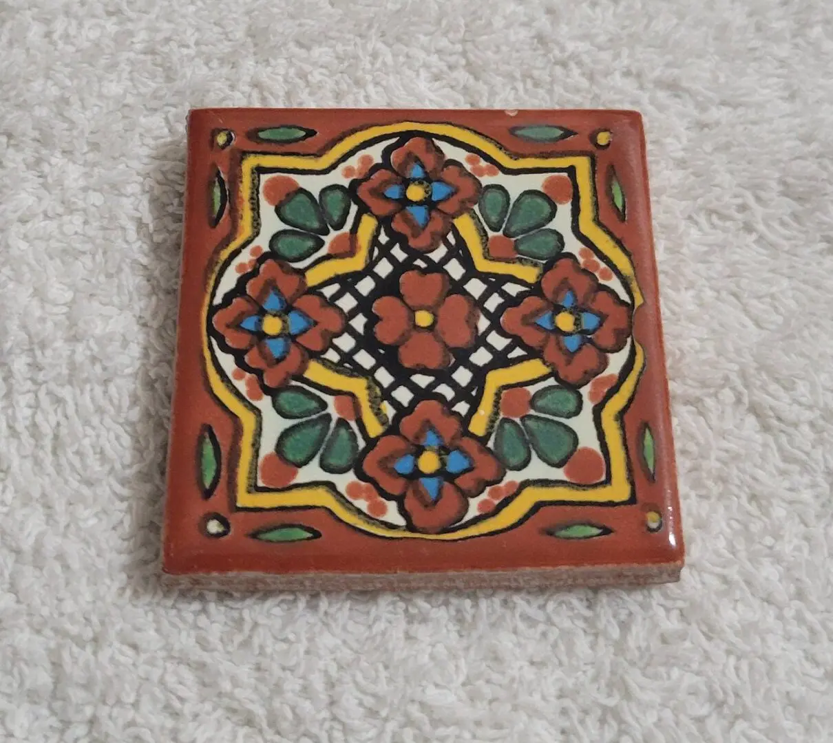Square hand-painted floral ceramic tile