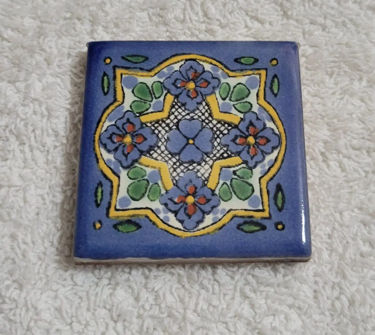 Blue floral hand-painted ceramic tile