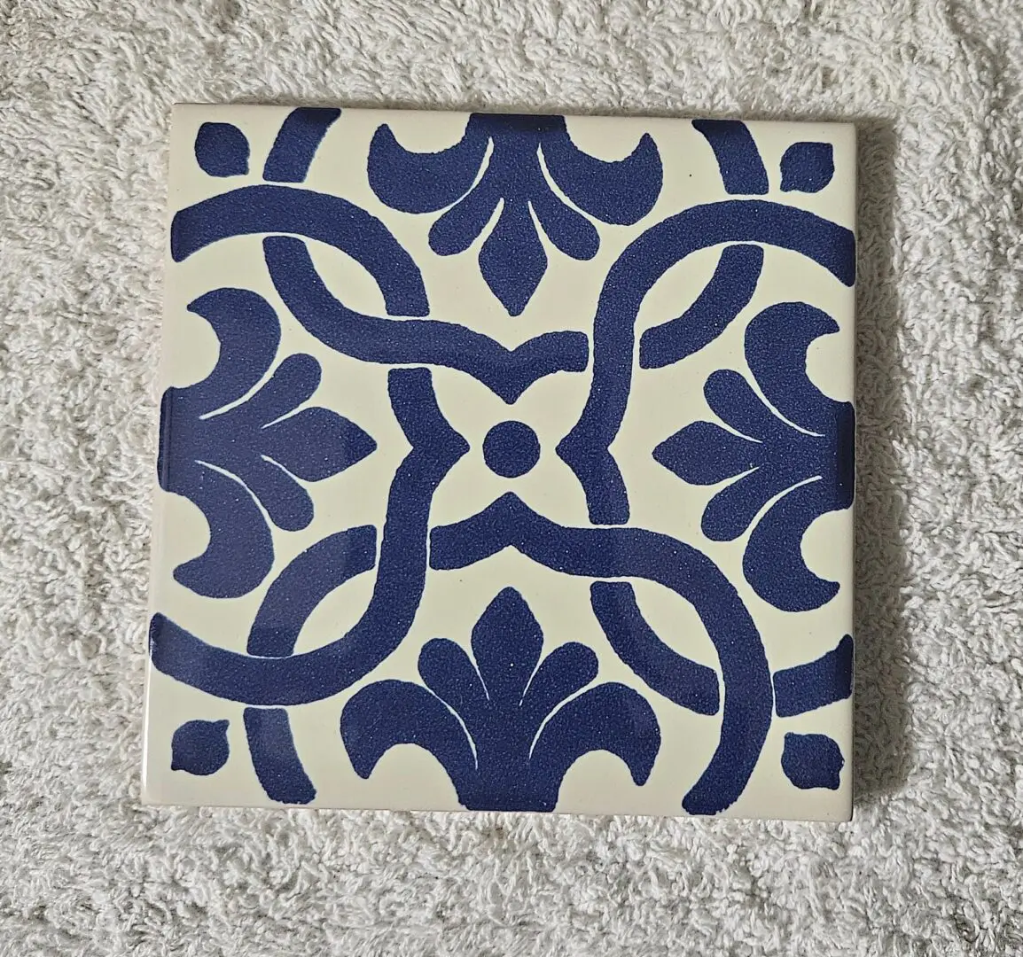 Blue floral patterned ceramic tile