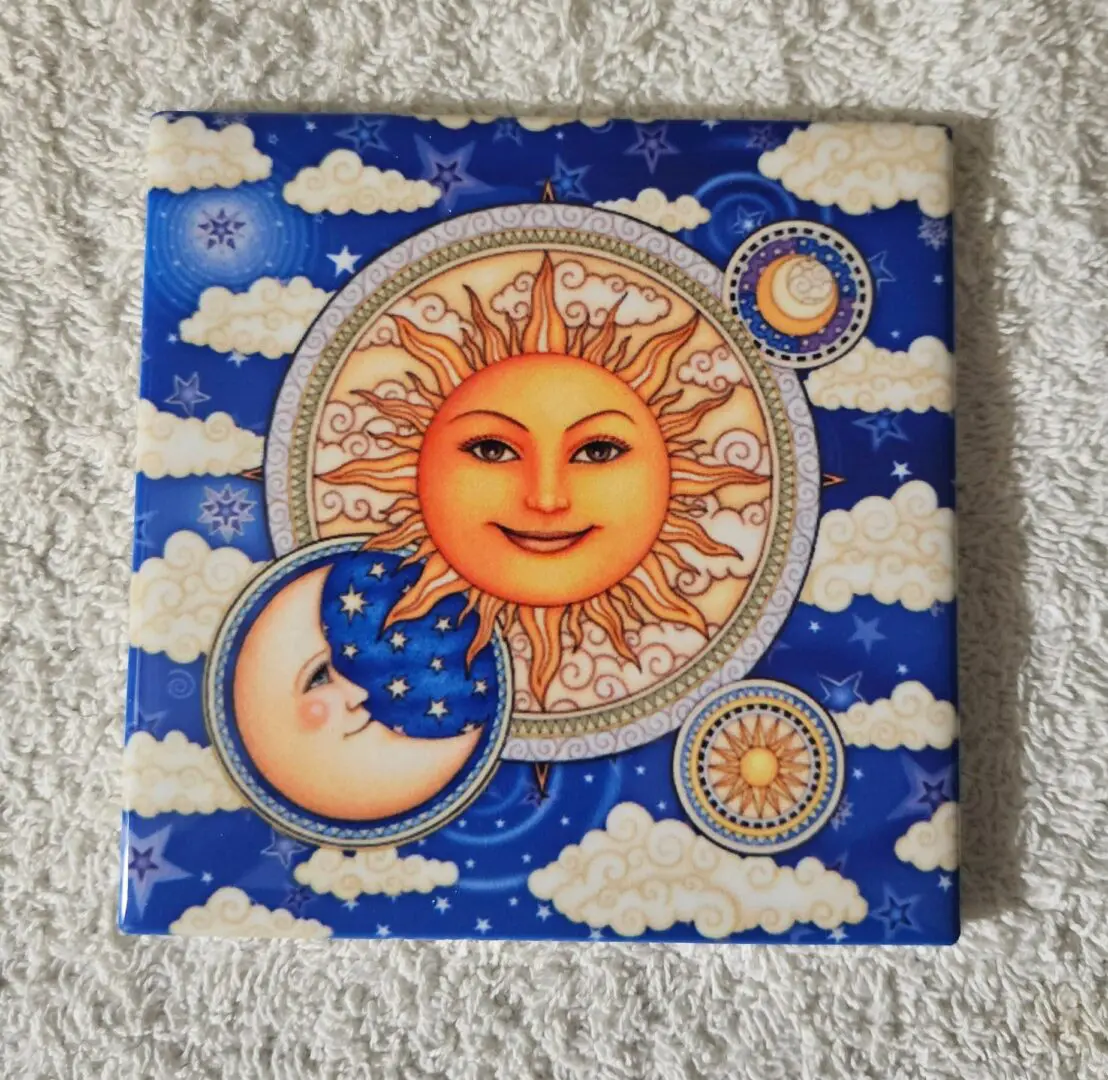 Sun and moon illustration with clouds background.