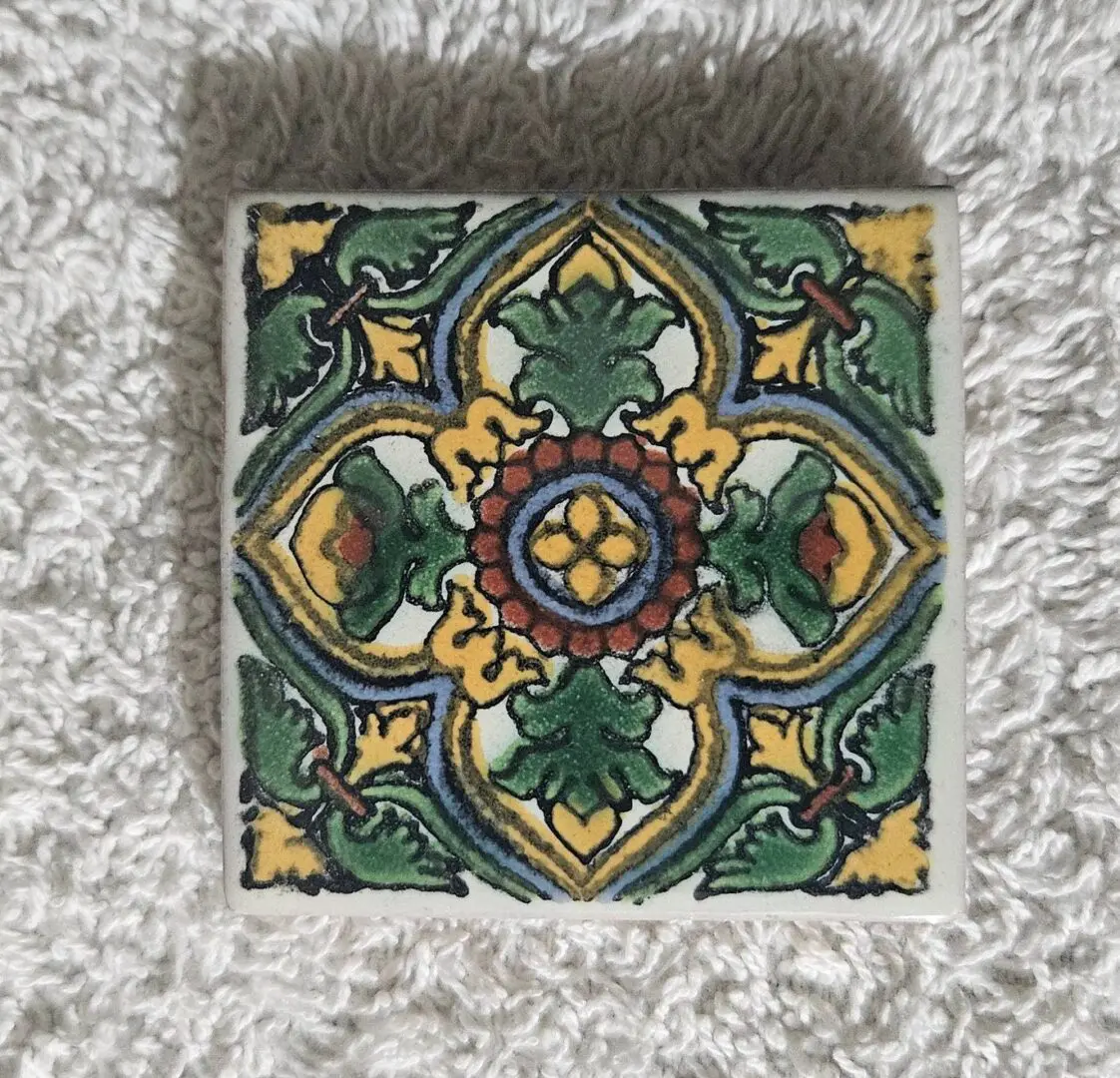 Square colorful ceramic tile with floral motif