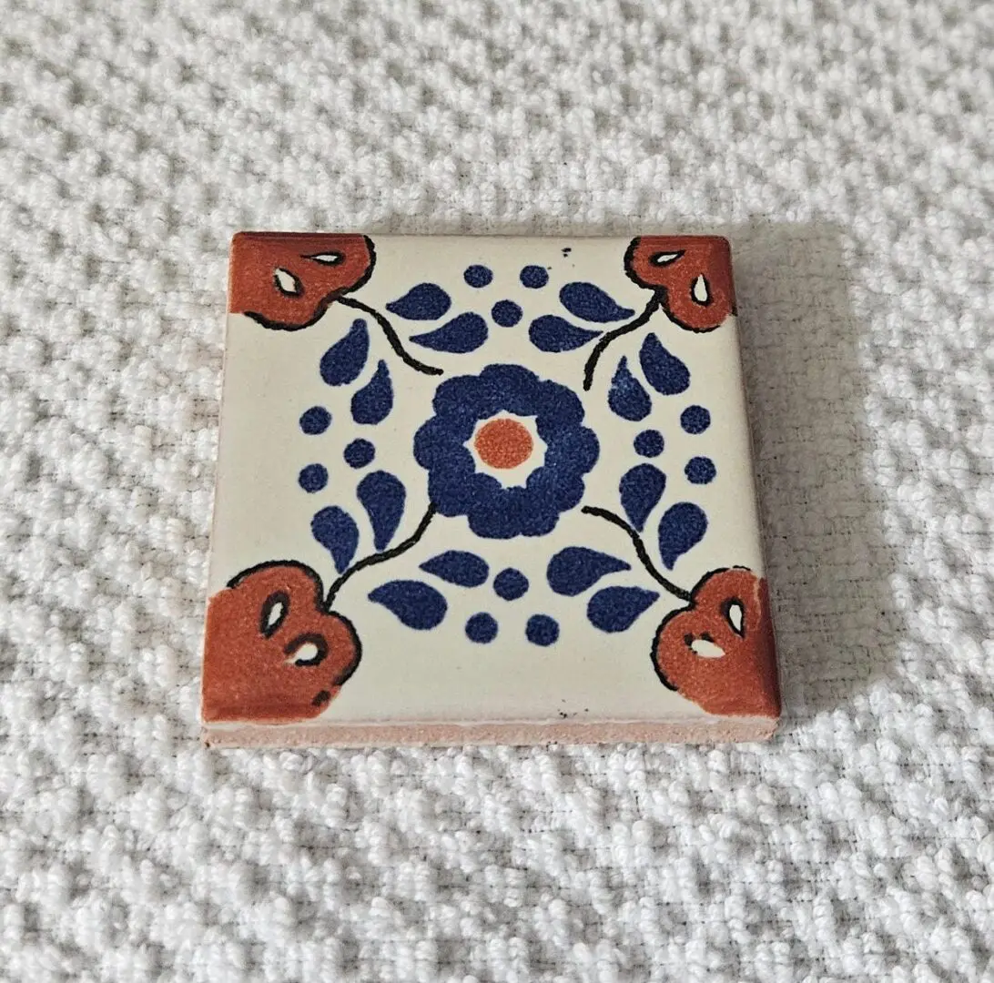 Blue and orange floral decorative ceramic tile