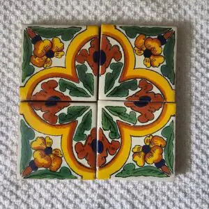 Colorful floral ceramic tiles with intricate design.