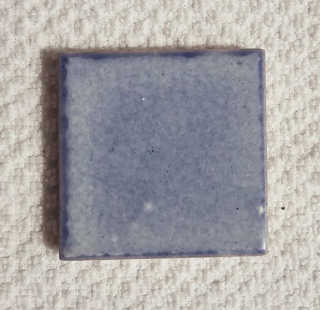 Square pale blue glazed ceramic tile