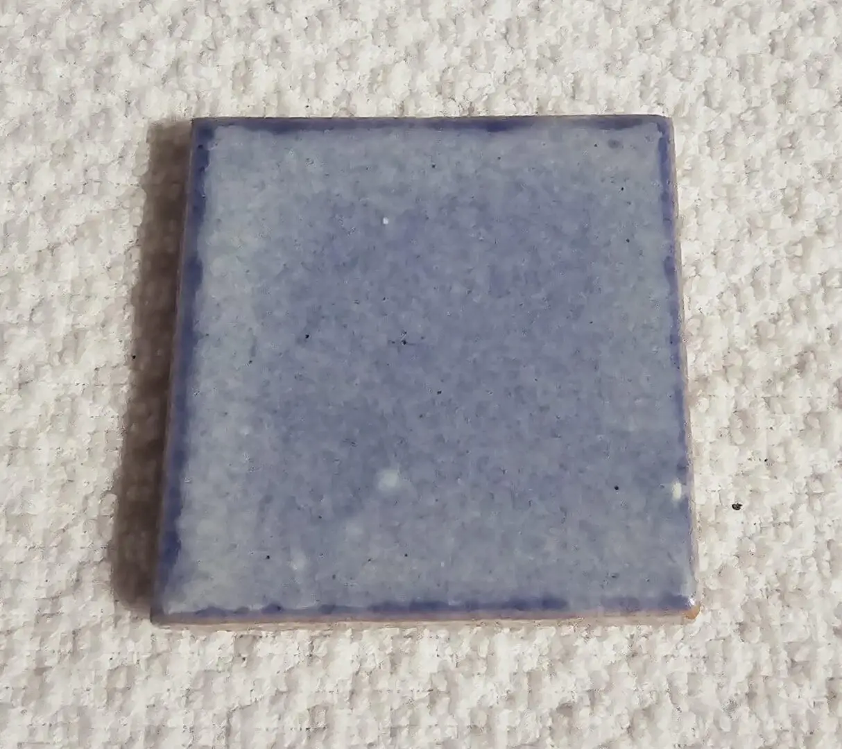 Pale blue glazed square ceramic tile