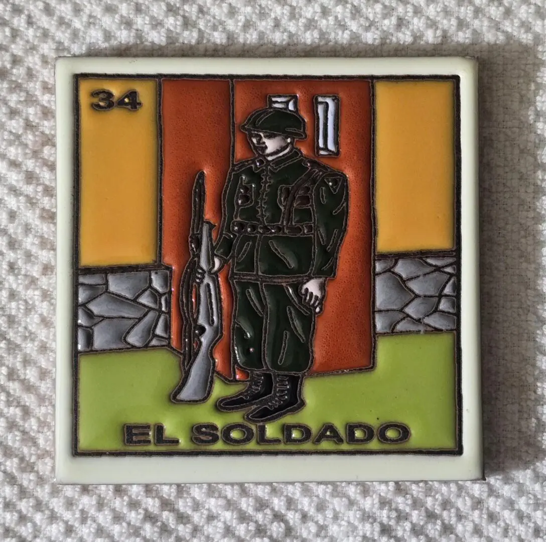 Soldier illustration on decorative tile, number 34.