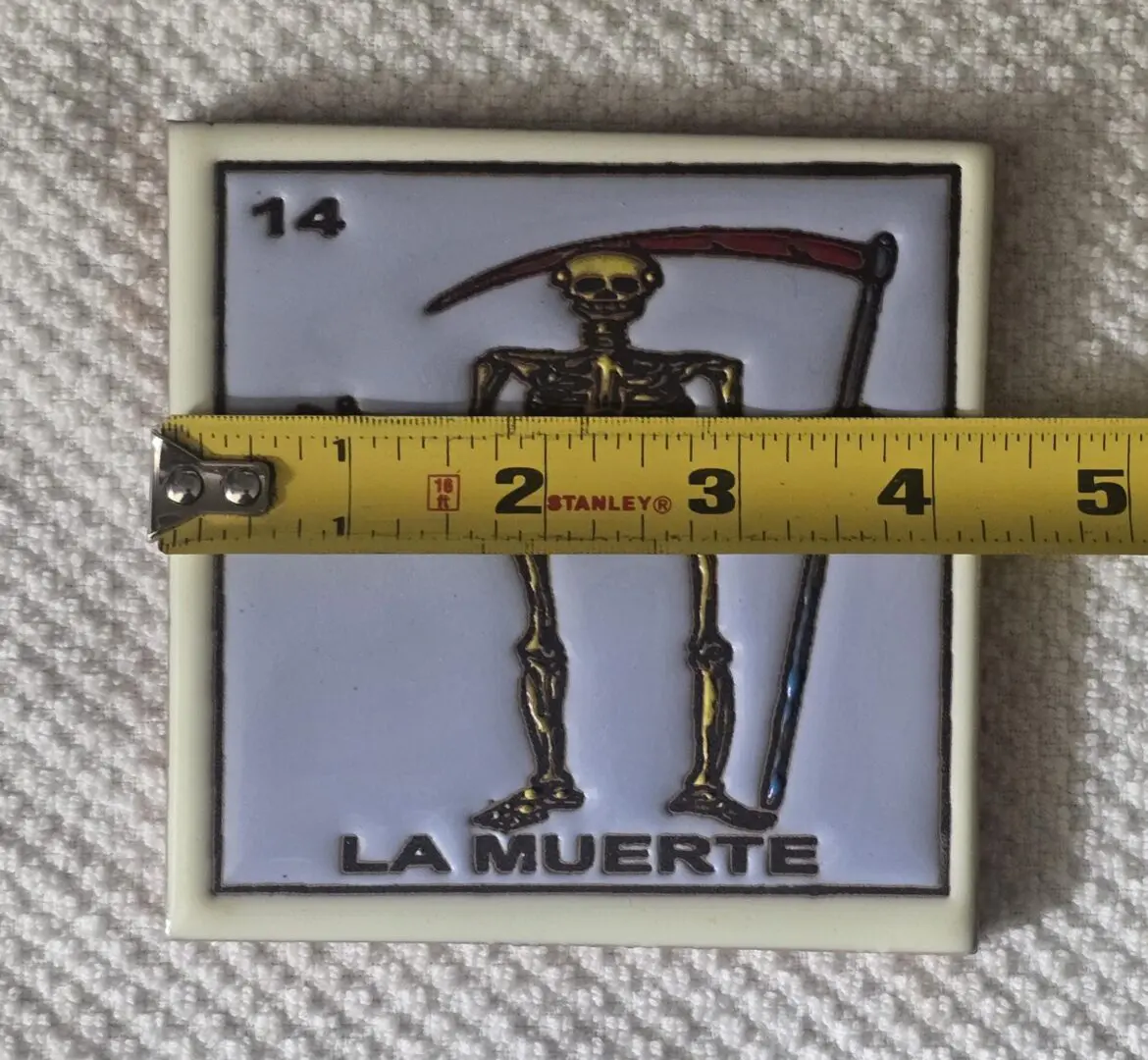 Tile with skeleton, measuring tape across.