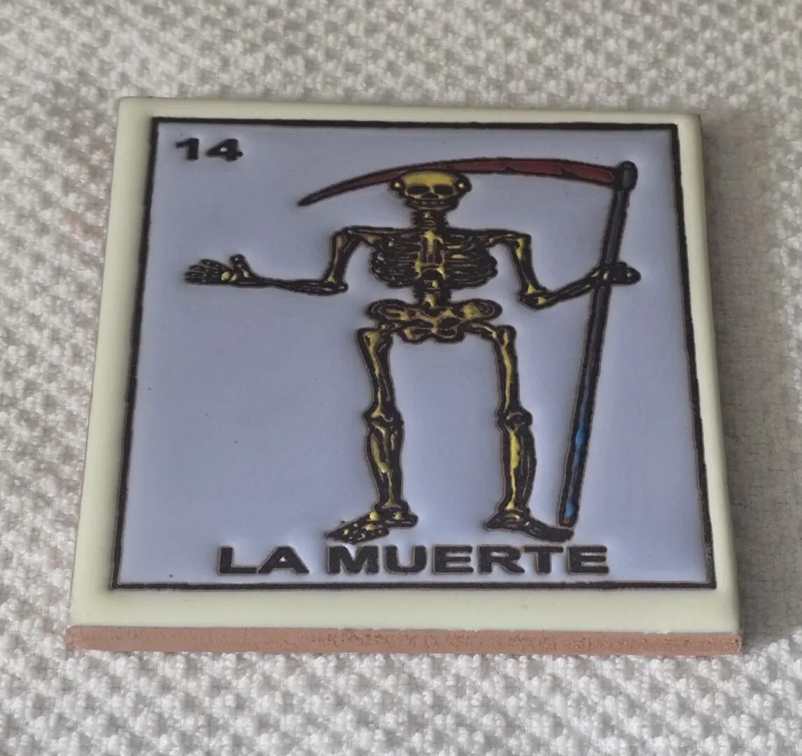 LoterÃa card depicting a skeleton with scythe.