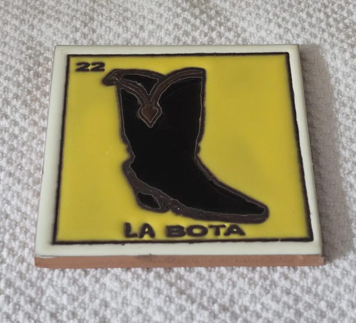 LoterÃa card with boot illustration, "La Bota.
