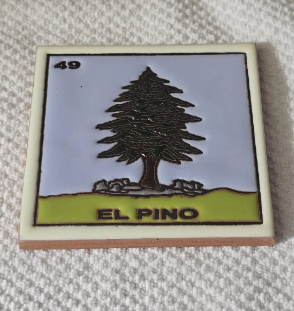 Tile with tree labeled "El Pino," number 49.