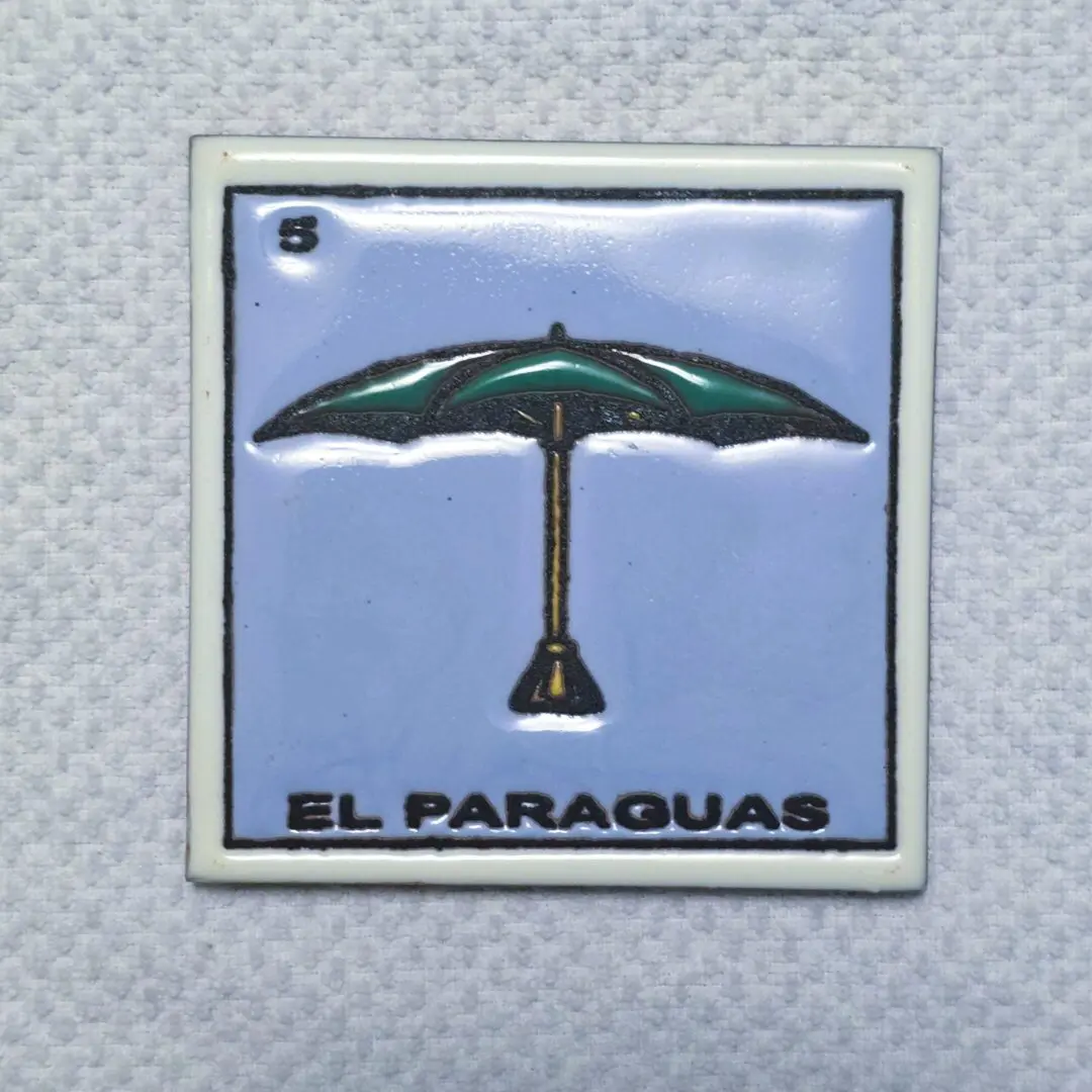 LoterĂa card with umbrella illustration.